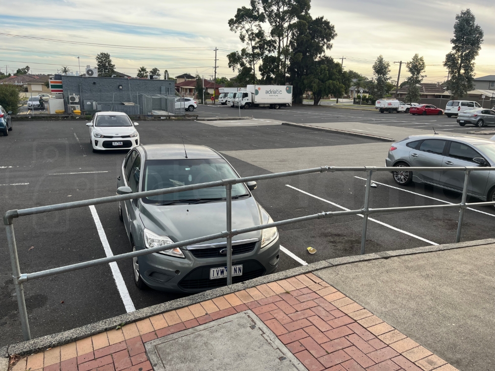 Interclamp 4000 series standard handrail fittings installed at a busy retail park